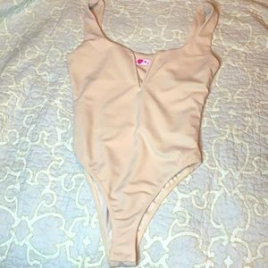 Tan bodysuit with front v cut